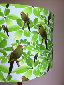 Partial view of a custom-made 53 cm diameter shade for a standard (floor) lamp made up in kākāriki fabric from The Sewphist.